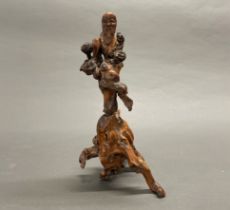 An early 20th century Chinese root wood carving, H. 30cm.