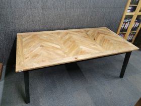 A large light oak dining table with painted base, 200 x 100cm.