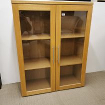 A light oak veneered display cabinet without base, 116 x 90 x 36cm.