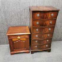 An inlaid mahogany six drawer chest with figured mahogany decoration to drawers and top, 105 x 50