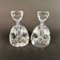 A pair of heavy cut crystal perfume bottles, H. 14cm.