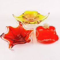 Three 1970's glass bowls, largest W. 29cm.