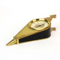 An unusual Le Coultre gilt brass bellows clock. L. 17 cms