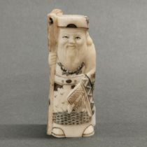 A hand carved bone Okimono of Jurojin (God of longevity) holding staff and fan.