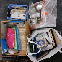 A large box and a large bag of mixed stamps.