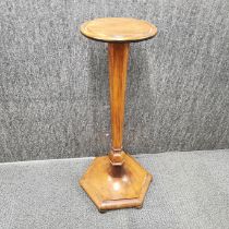 An Art Deco golden oak plant stand with hexagonal base, H. 80cm.