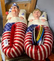 A pair of vintage novelty president Reagan slippers with a group of badges and patchwork quilt.