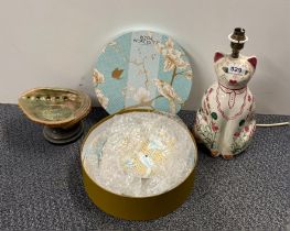 A Royal Worcester cake stand, a ceramic cat and a shell bowl.