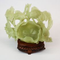 A large Chinese carved jade fish and lotus bowl and stand. W. 23 H. 19 cms