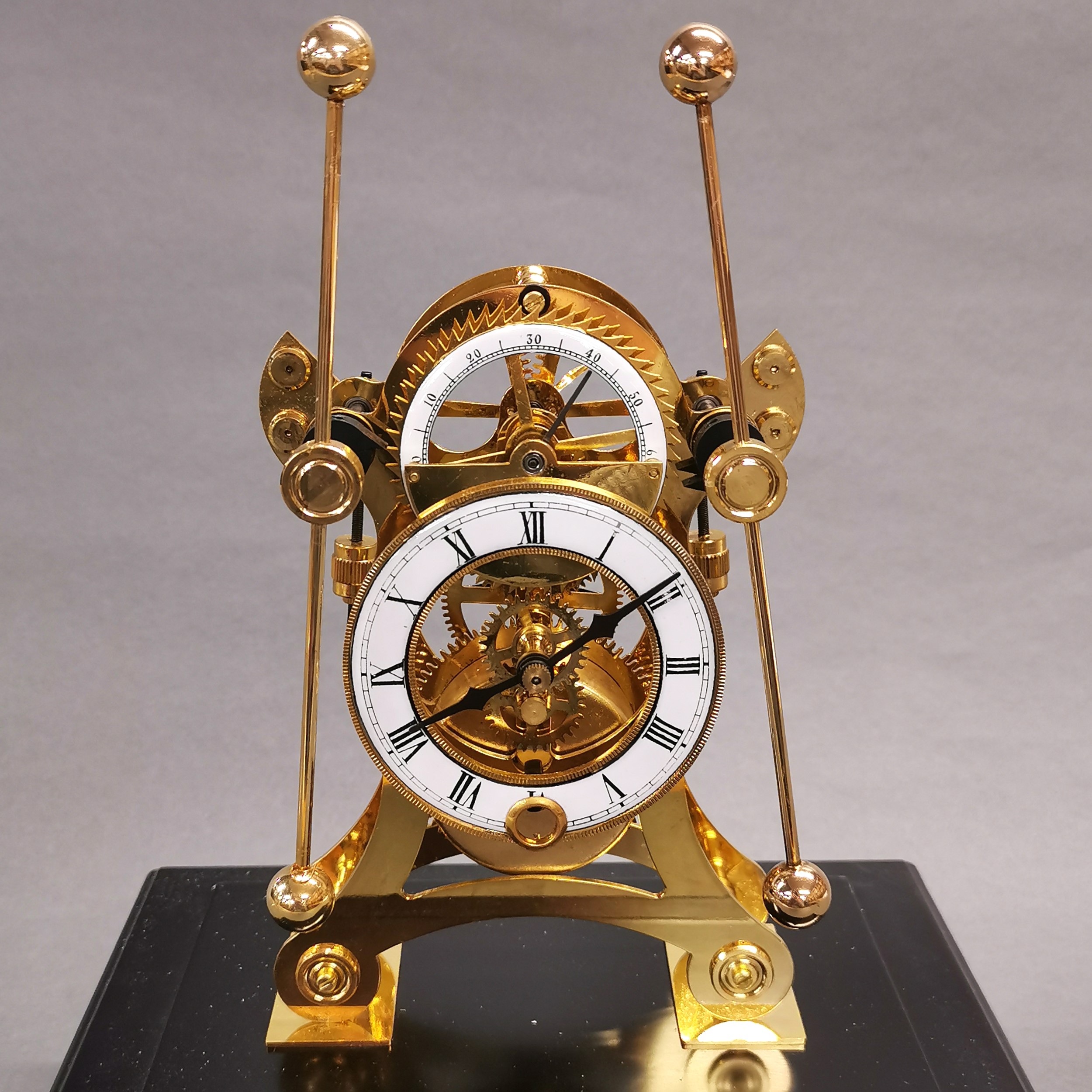 A brass and glass cased grasshopper clock. Case size 24 x 20 x 14cm. - Image 2 of 3