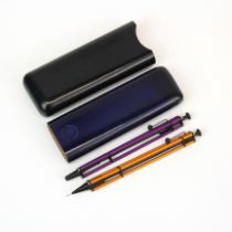 Two Parione propelling pencils with leather case. Case L.14 cms.