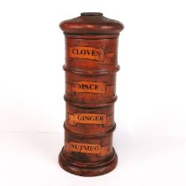 A turned wooden spice tower, H. 20cm.