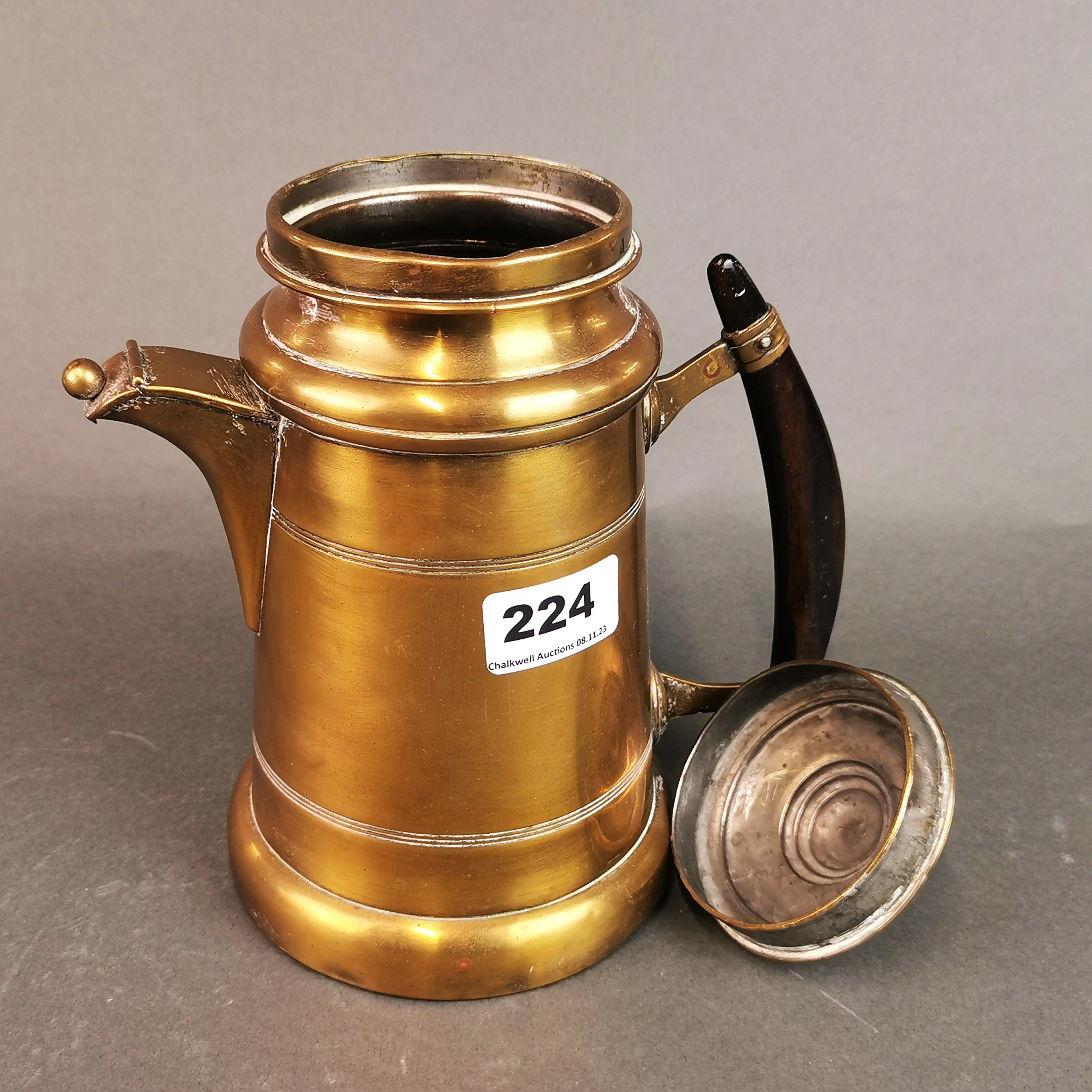 An Eastern hammered copper two handled pan, W. 38cm, together with a 19th century brass jug with - Image 2 of 3