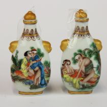 Two Chinese porcelain snuff bottles with erotic decoration, H. 11cm.