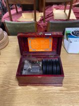 An 1920's/30's Japanese music box with discs, 30 x 18 x 18cm.