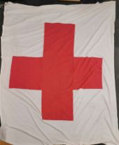A large cotton red cross flag stamped SS 1942. flag size 180 x 230cm.