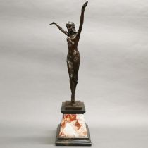 An Art Deco style bronze figure of a dancing girl on a marble base, H. 56cm.