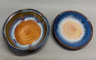 Two lovely studio pottery plates/bowls with glazed decoration, Dia. 30cm.