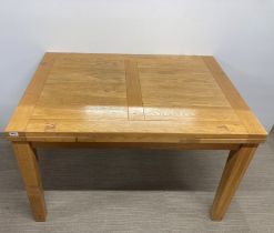 An oak draw leaf kitchen table, 120 x 86cm (not extended).