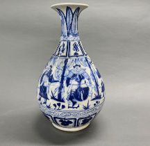 A large Chinese blue and white porcelain vase decorated with figures and characters, H. 46cm.