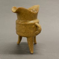 A Chinese three legged crackle glazed jui cup, H. 19cm.