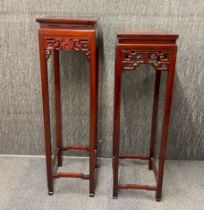 A pair of Chinese hardwood plant stands, tallest H. 120cm.