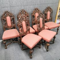 A set of six carved oak Victorian panel backed dining chairs from Nether Winchendon House,