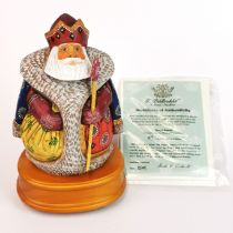 A G.DeBrekht carved and painted wooden musical figure of Royal Santa, limited edition 907/1500. With
