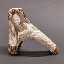 A hand-carved Stag Antler depicting the Buddha in Abhayamudr?, exquisitely carved in relief and