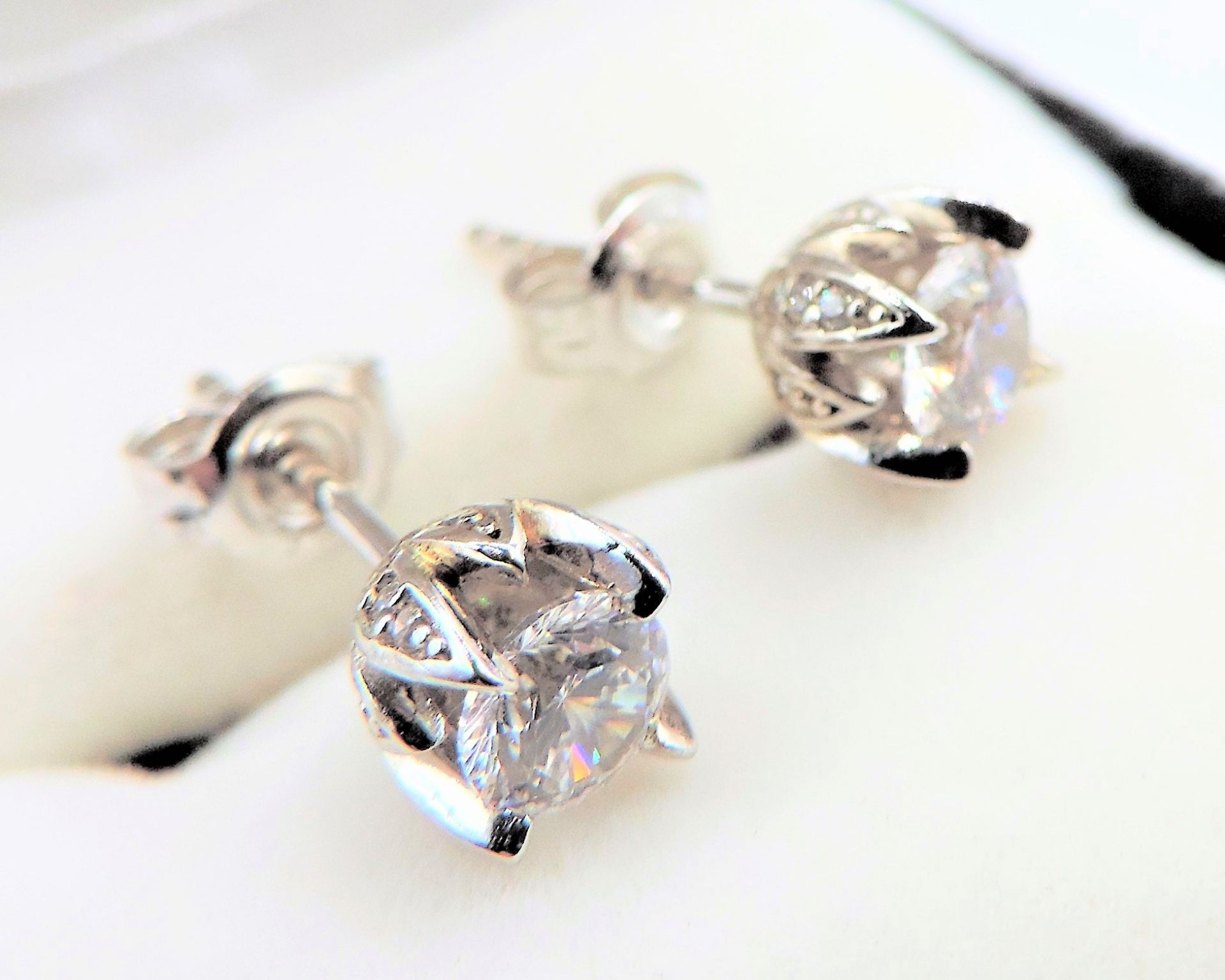 Sterling Silver Moissanite Stud Earrings New with Gift Pouch. A gorgeous pair of stud earrings in a