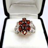 Sterling Silver Garnet & Diamond Ring New With Gift Pouch. A beautiful sterling silver ring set wit