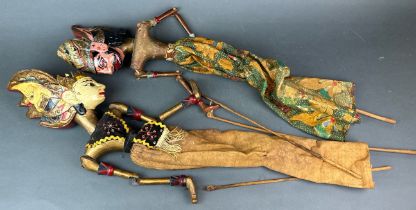 Two old Indonesian painted wooden puppets, L. 50cm.