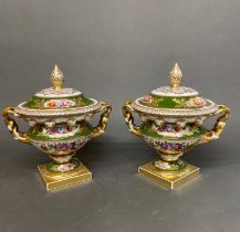 A pair of fine Vista Alegre Portuguese porcelain urns and covers, H. 26cm.