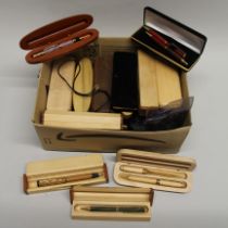 A quantity of presentation pens, mostly in wooden boxes.