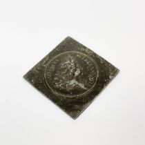 A cast bronze medal for King Philip, 5.7 x 5.7cm.