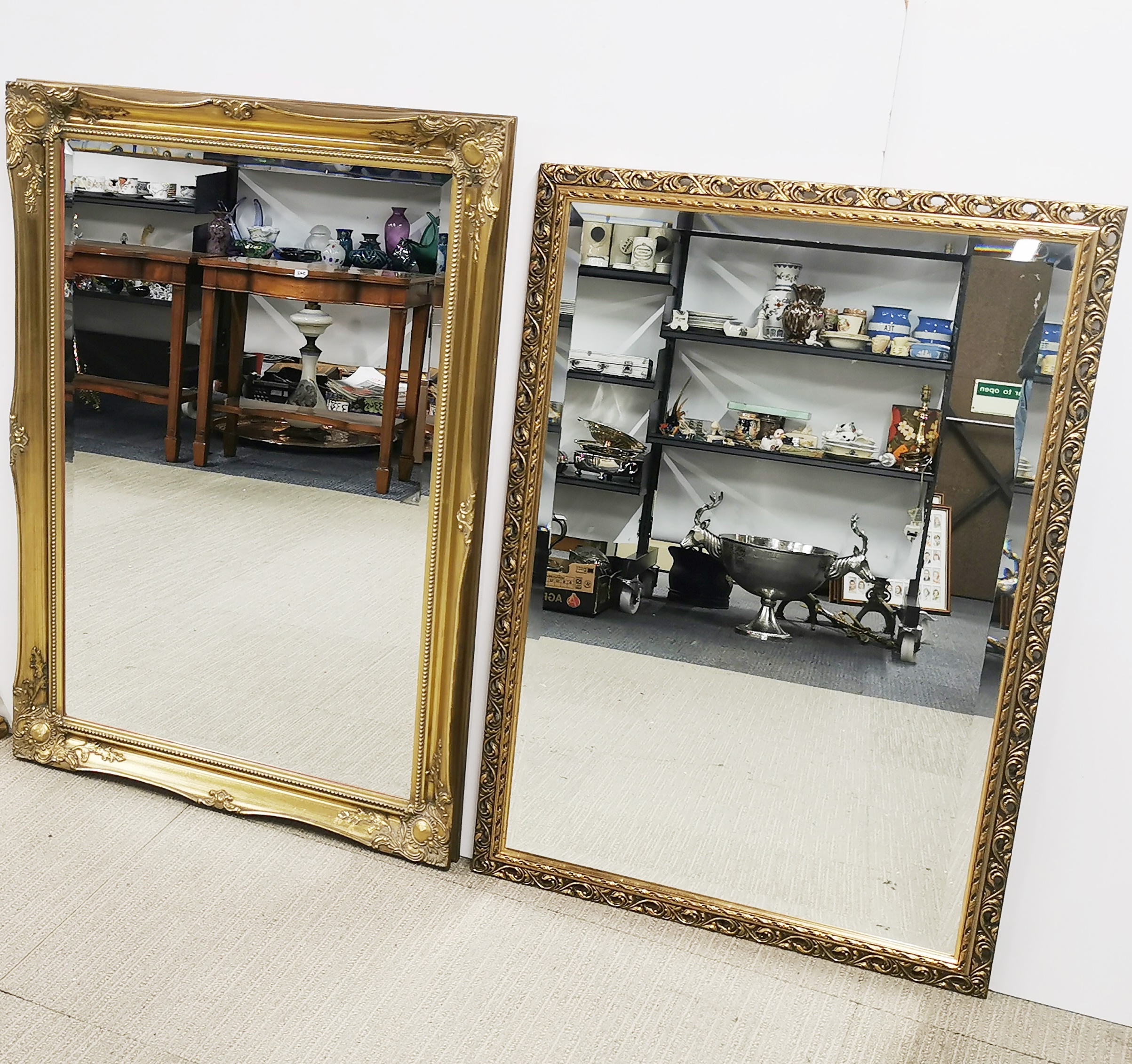 Two heavy gilt framed mirrors, largest 105 x 75cm.