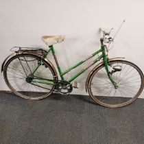 A Halfords Catkin bicycle, overall L. 170cm.