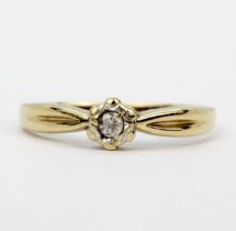 A hallmarked 9ct yellow gold diamond solitaire ring, (N).