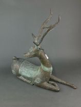 A large Chinese cast bronze/brass figure of a deer, H. 56cm.