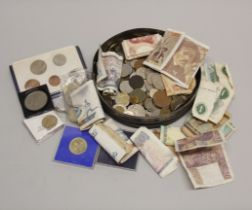 A quantity of mixed coins and notes.