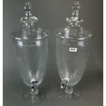 A pair of large cut glass spirit jars and lids with chromium plated taps, H. 64cm.