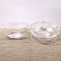 A large signed crystal and etched glass bowl, Dia. 30cm. Together with a further signed bowl.