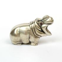 A Russian .84 silver model of a hippo with cabochon ruby eyes, L. 7.5cm. H. 5cm.