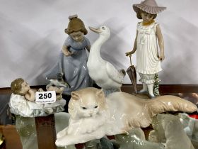 A group of five Nao porcelain figurines, one repaired.