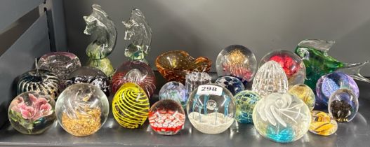 A collection of mixed paperweights, tallest 16cm.