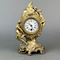 A mid 20th C. gilt brass mantel clock, H. 23cm.