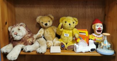 A Merrythought teddy bear and other mixed toys.