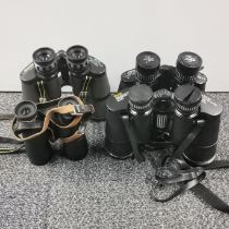 Four pairs of binoculars.