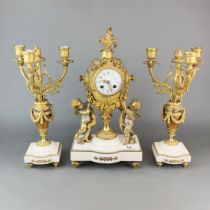 A 19th C. French gilt metal and white marble 3 piece clock garniture, H. 45cm.