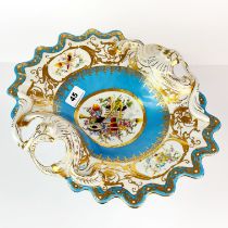 A continental porcelain centrepiece, W. 35cm. H. 20cm.